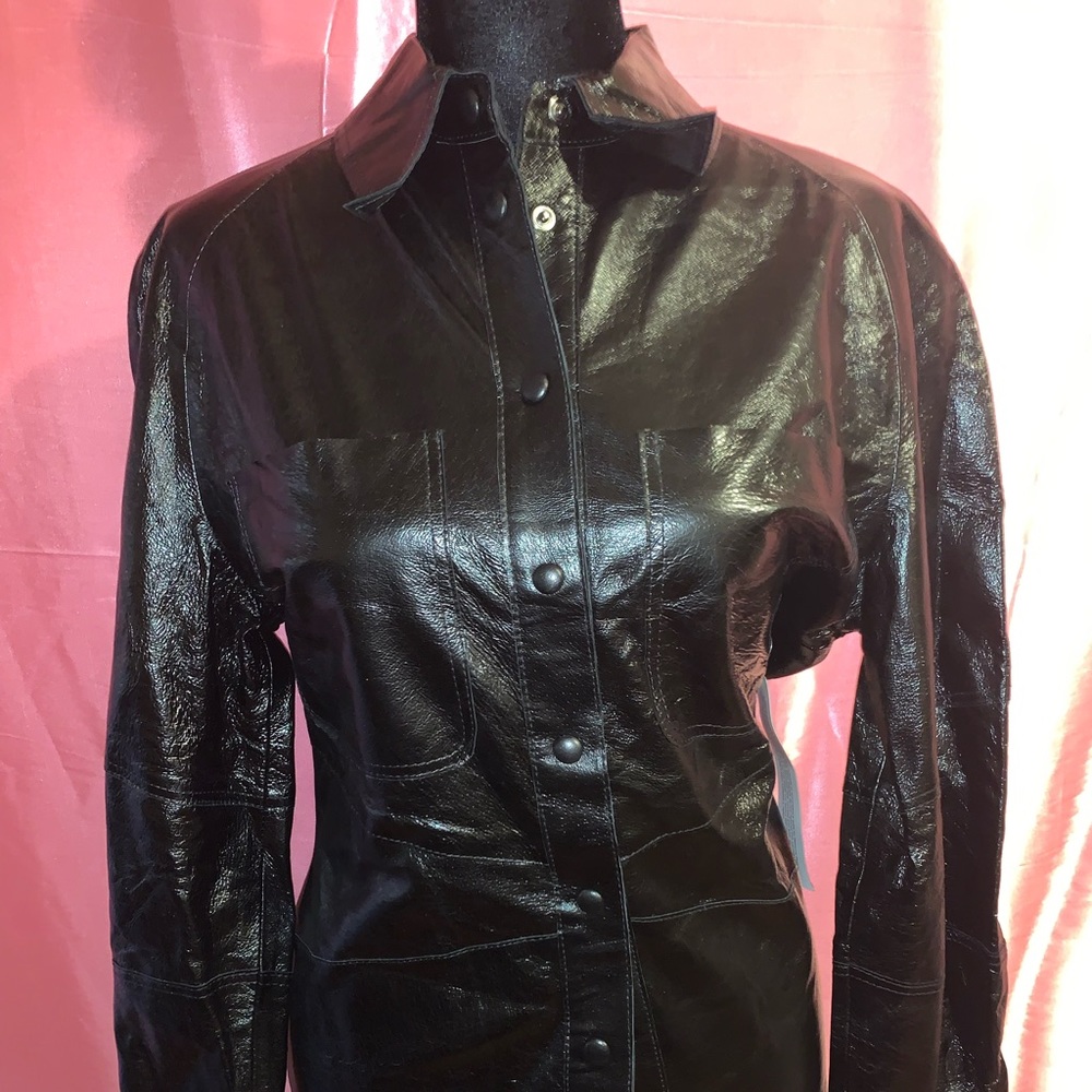 Women’s size 4 brand new with tags top shop, black button-down shirt.